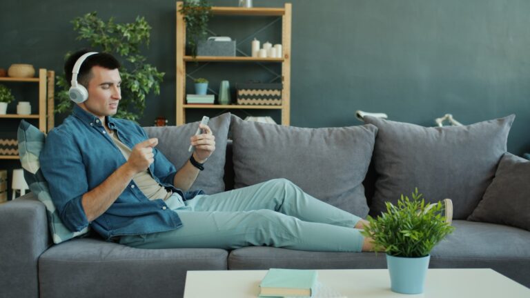 Person relaxing sofa