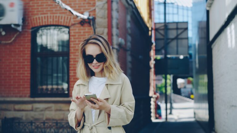 Woman texting smartphone